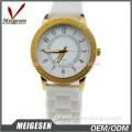 3 ATM water resistant gold color white band female watches